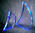 Clear acrylic, spinnaker sailing trophies, blue bottom edge